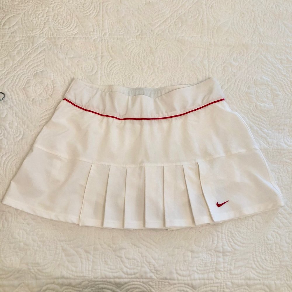 white NIKE tennis shirt